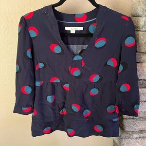 Boden navy blue pull over top with black blue and red circle accents, size 4